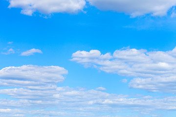 Poster - summer blue sky with white fluffy clouds.