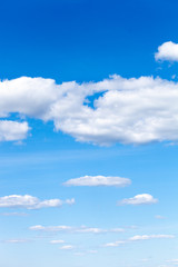 Poster - summer blue sky with white fluffy clouds.