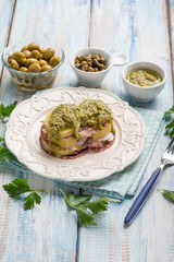 Poster - octopus carpaccio with potatoes green olives capers and pesto sauce