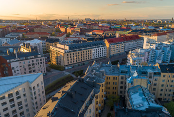 Aerial sunset view of beautiful city Helsinki . Colorful sky and colorful buildings. Helsinki, Finland.