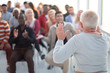 © ASDF - successful older woman talking about something at a business training