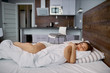 © Roman - pretty sweet caucasian woman is sleeping on bed and hugging blanket, enjoy, relax, have rest.