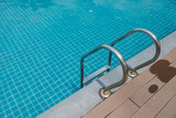 Fototapeta  - Swimming pool stairs in the hotel