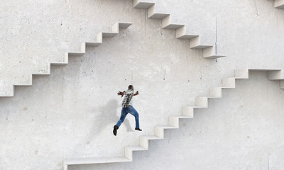 Wall Mural - Image of businessman walking upstairs