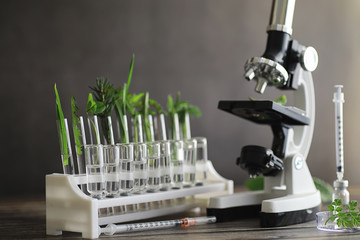 Microscope and test partings on the table in the laboratory.