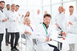 © ASDF - group of researchers at the workplace in the laboratory.