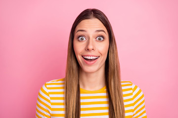 Close-up portrait of her she nice-looking attractive lovely pretty amazed glad girlish funny cheerful cheery straight-haired girl good news reaction isolated over pink pastel color background