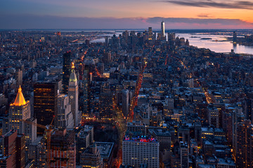 Wall Mural - New York City aerial view of the skyscrapers of Manhattan at twilight. The view includes Lower Manhattan, Flatiron District, Midtown and the World Trade Center. NY, USA