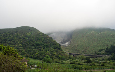 Wall Mural - mist mountains in summer morning