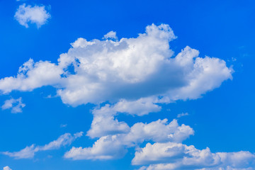 White fluffy clouds in the blue sky