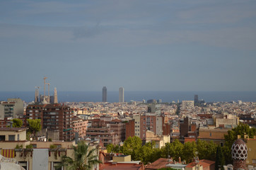 City View from park Guell with barcelona city skyline. Barcelona, the cosmopolitan capital of Spain’s Catalonia region, is known for its art and architecture. 