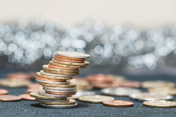 Baht coins are stacked in different positions.