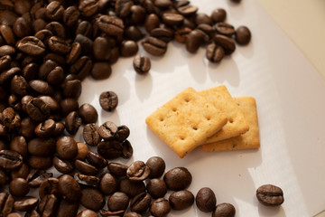 large cookies roasted coffee beans on a white background