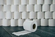 © RooM The Agency - Roll of toilet paper in front of a stack of toilet rolls