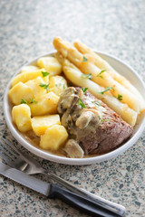 Wall Mural - Beef steak with mushroom sauce & baby potatoes & white asparagus