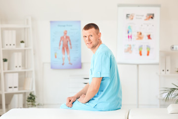 Poster - Portrait of massage therapist in medical center