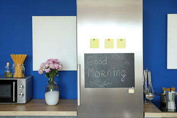 Canvas Print - Chalkboard on door of refrigerator in kitchen