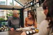 © bnenin - Family time. Senior mother eating lunch with her daughters, at home.