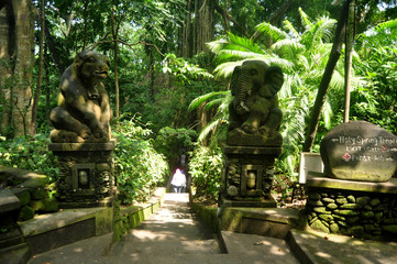 Art sculpture and carved antique deity angel god of hindu statue balinese style in Mandala Suci Wenara Wana or Ubud Sacred Monkey Forest Sanctuary at Ubud city in Bali, Indonesia