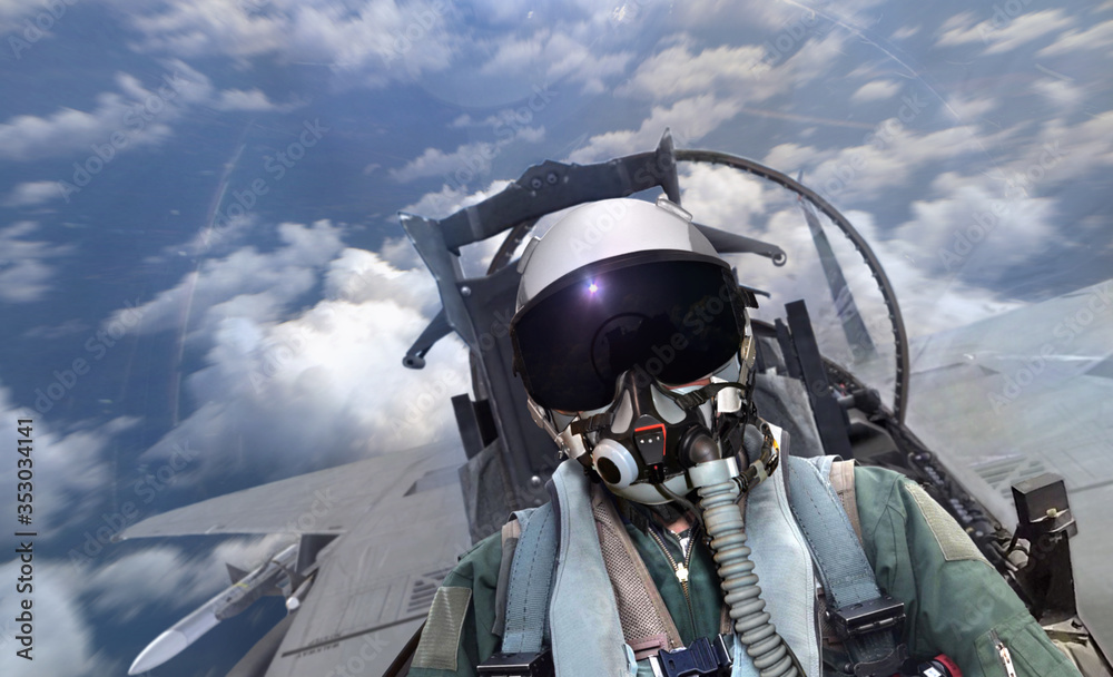 Jet fighter pilot flying over cloudy sky with motion blur - obrazy, fototapety, plakaty 