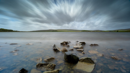 Atmospheric stormy skies over Mlaham Tarn, Yorkshire Dales National Park