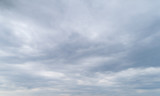 Fototapeta Na ścianę - Cloudy gray sky with thick dense clouds.