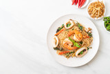 Fototapeta Tulipany - stir-fried Chinese noodle with basil, chilli, shrimps and squid