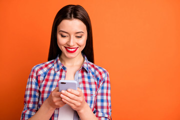 Sticker - Close up photo of positive cheerful girl use smartphone read social media blogging information chatting with girlfriend wear checkered outfit isolated over bright color background