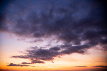 Colorful dawn / dusk sky with dark clouds