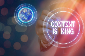 Poster - Conceptual hand writing showing Content Is King. Concept meaning believe that content is central to the success of a website Elements of this image furnished by NASA