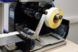 © Svetlana - sticky label roll in labeling machine