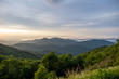 Scenic sunrise view of the Blue Ridge Mountains near Asheville, North Carolina from the Blue Ridge Parkway, a scenic byway stretching across the mountains of western NC.