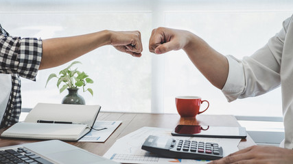 Poster - Teamwork of business people partnership giving fist bump to greeting