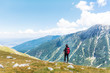 © boryanam - Hiker Woman with Backpack on the Top of a Mountain with Stunning View.Pirin Mountain ,Bulgaria