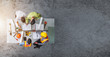 © ETAJOE - Group engineer and architects meeting at construction site,discussing, designing, planning, measuring layout of building blueprints in construction site floor at factory, top view and copy space