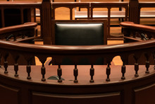 A Witness Stand With A Black Seat In The Court Room Infront Of Tribunal When Witness Testify Of Evidence To Judge, They Will Sit At Here For Testimony Of Witnesses, It Is Vintage Or Retro Style