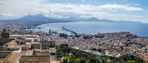 Aerial view of Naples and his port with Vesuvio volcano in background