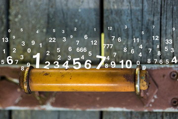 Wall Mural - white numbers walk on a doorknob, numerology