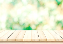 Blurred Background Of Green Park In Summer, Wood Table Top On Shiny Bokeh Green Background. For Product Display