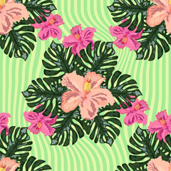  Exotic seamless pattern with tropical leaves and flowers on a black background. Striped background.