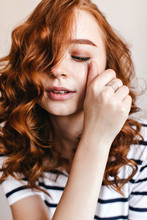 Close-up Portrait Of Spectacular European Lady Wears Silver Ring. Joyful Ginger Girl Posing With Eyes Closed.