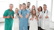 © ASDF - diverse medical professionals giving a thumbs up