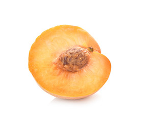 Wall Mural - Peach fruit half with leaf isolated on white background