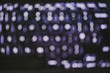 © faithie - blurred background of backlit keyboard with led light
