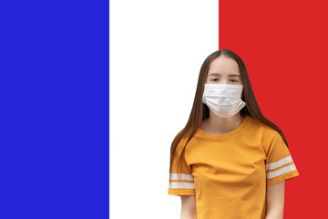 Poster - Coronavirus in France. Young girl in antibacterial medical mask on a flag background with copyspace