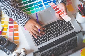Fototapete - The graphic designer creative team is currently working on the design and color selection on the guide color for advertising design.