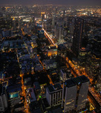 Fototapeta Nowy Jork - panoramic skyline of Bangkok by night from King Power Mahanakhon, Bangkok, Thailand