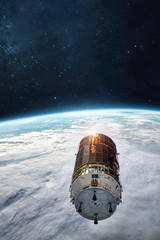 Leinwandbilder - Cargo spaceship on orbit of the Earth planet. Satellite. Exploration of space. Elements of this image furnished by NASA	
