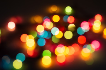 Wall Mural - colorful bokeh from chrismas light on black background