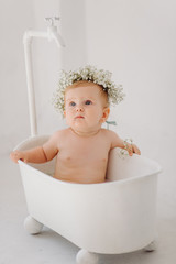 Wall Mural - sweet baby girl in bathroom